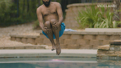 gif of a guy cannonballing into a pool