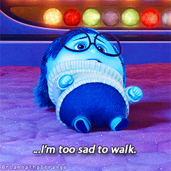 Sadness from Inside out saying "I'm too sad to walk" while lying on the floor