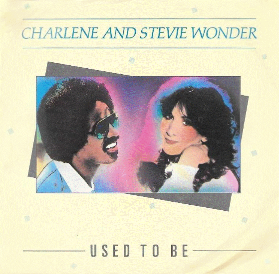 The cover of USED TO BE by Charlene and Stevie Wonder. Stevie is smiling at Charlene.